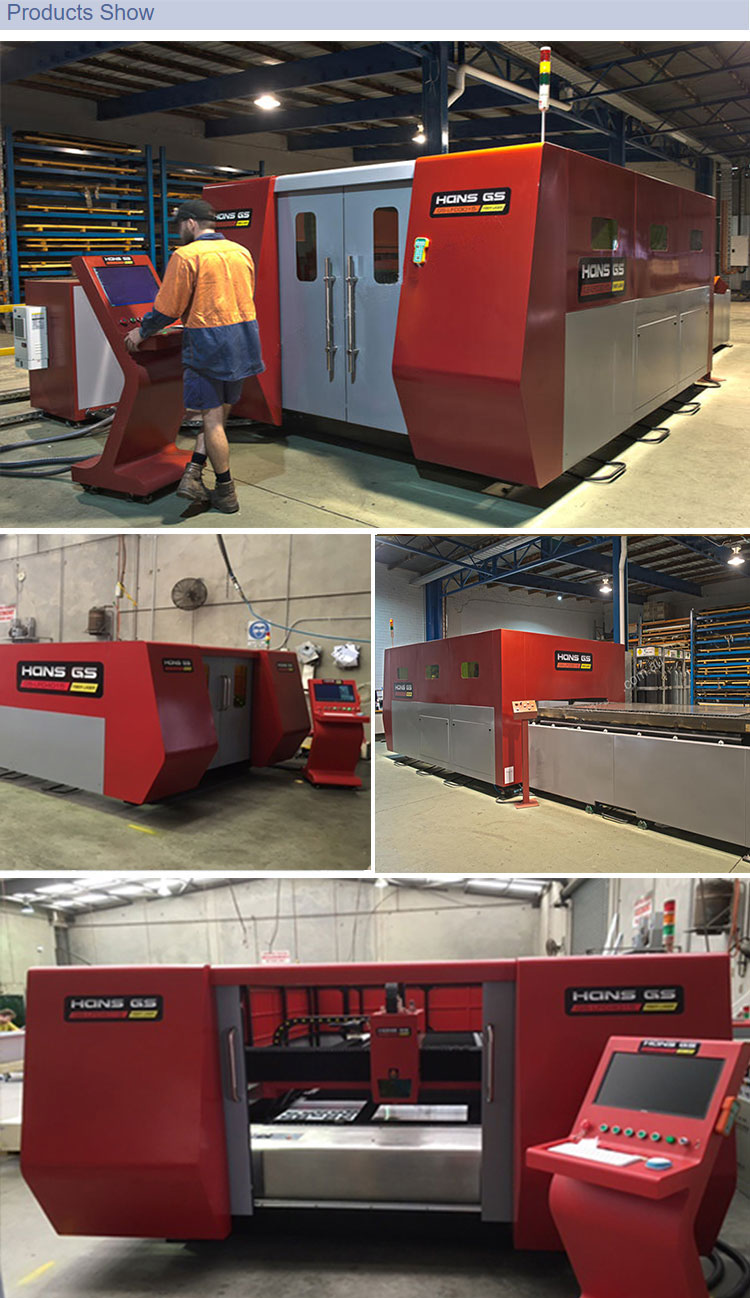 Fiber laser cutting machine with exchange table and enclosed safety housing