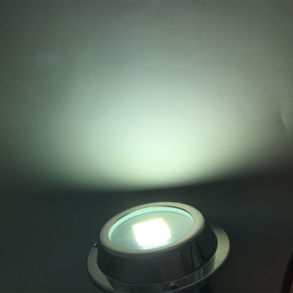 Underwater LED light illuminated in blue