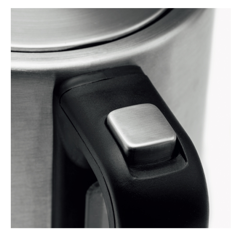 Close-up of kettle handle and lid mechanism