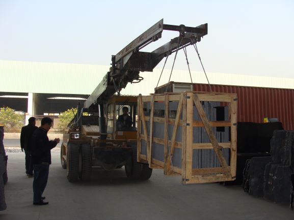 11-ton telescopic crane loader performing material handling