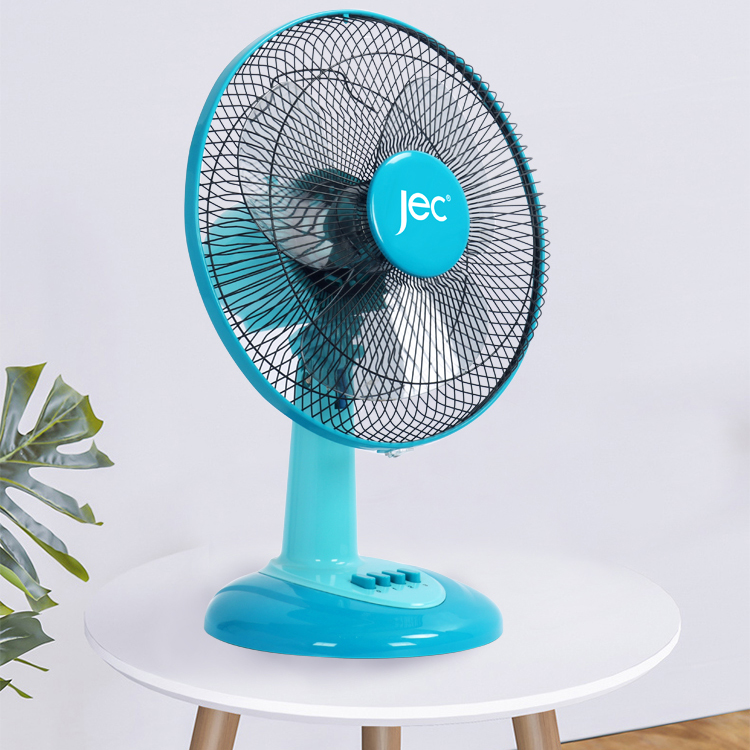 Blue table fan with push button controls