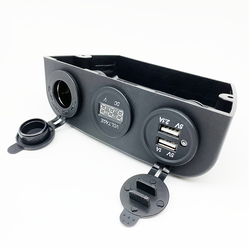 Close-up of the 3-in-1 panel showing voltmeter and USB ports