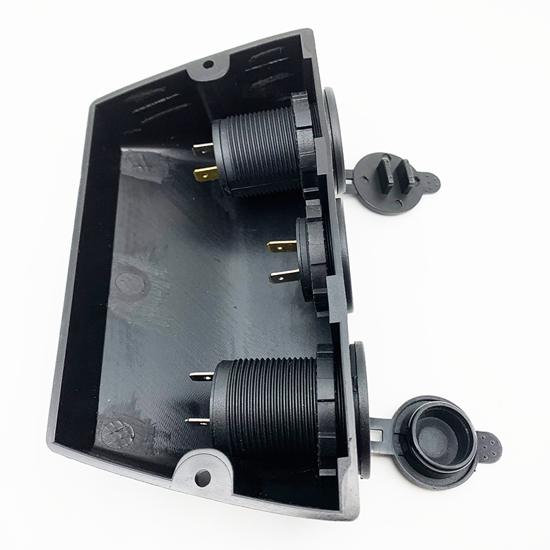 Full view of the triple port power outlet assembly