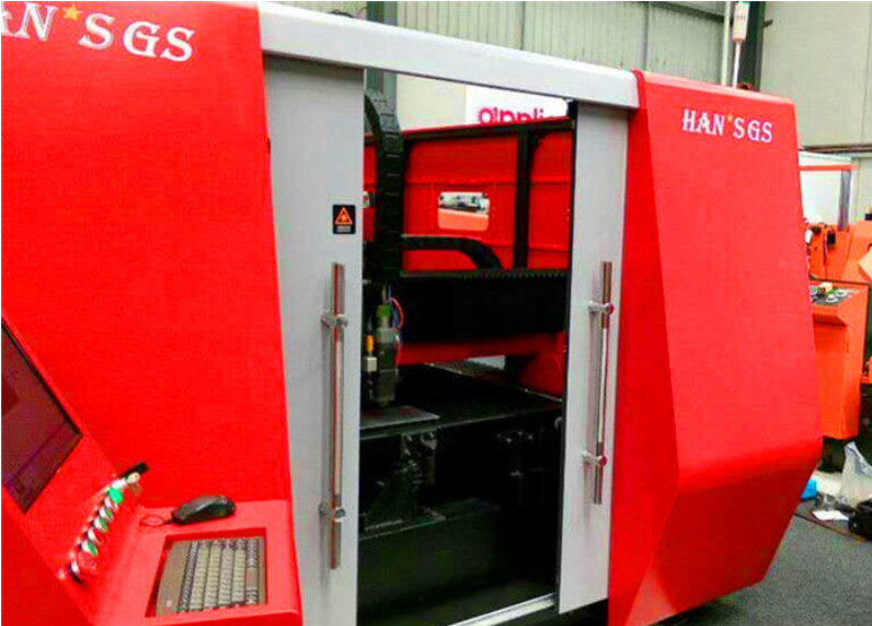 Industrial CNC fiber laser cutting machine showing robust frame and cutting area