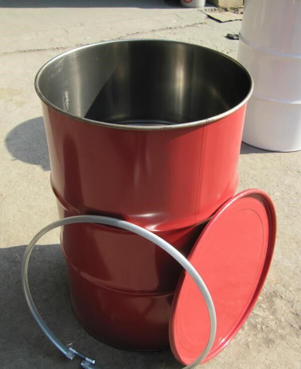 Components of a 200L steel drum including lid and clamping ring