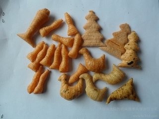 Assorted extruded corn snack shapes