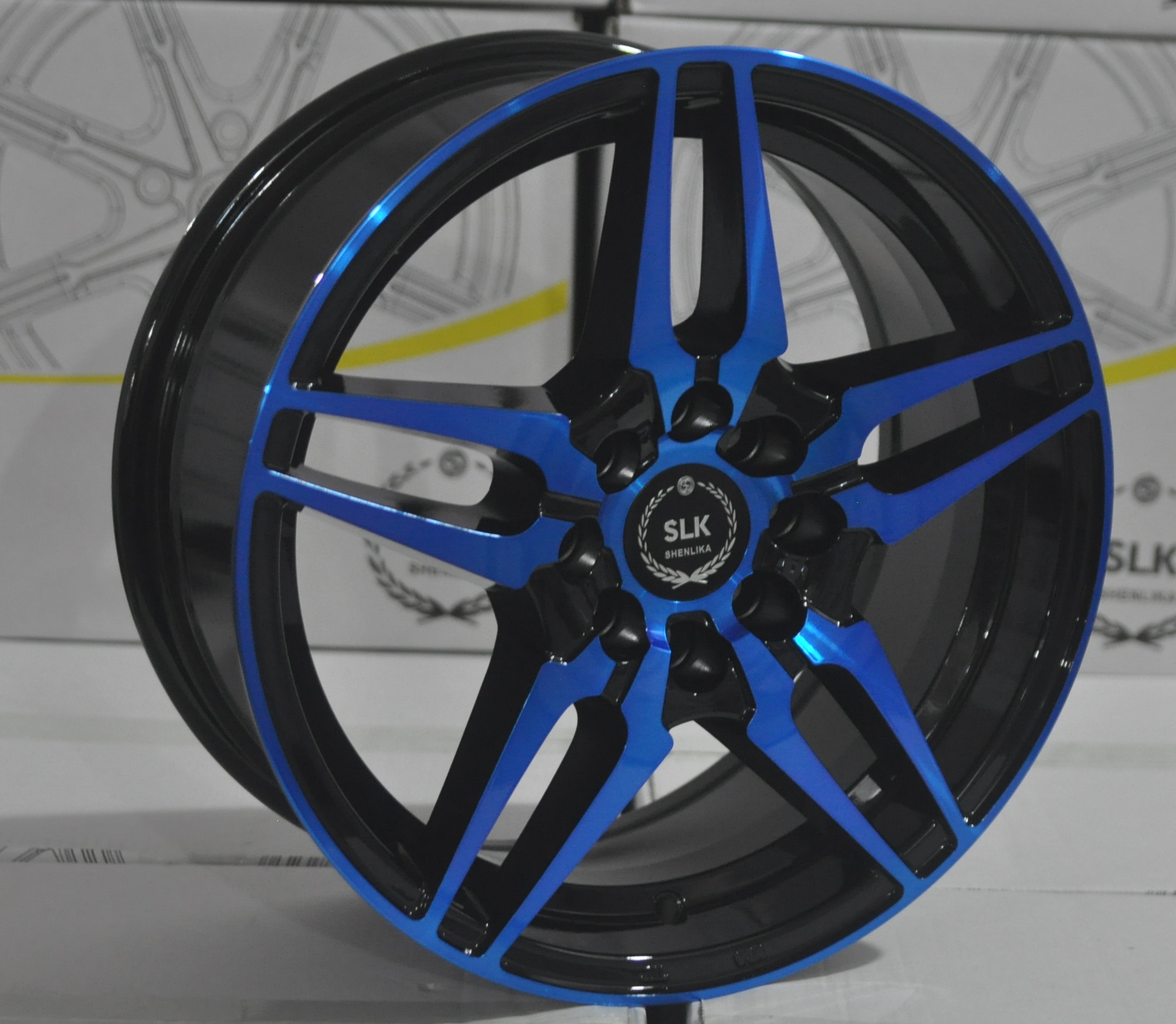 Five-Spoke Alloy Wheel with Blue Accents