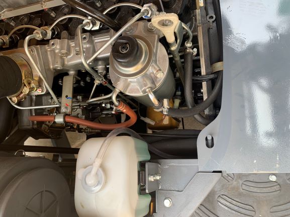 Engine compartment showing LPG fuel system and cooling components