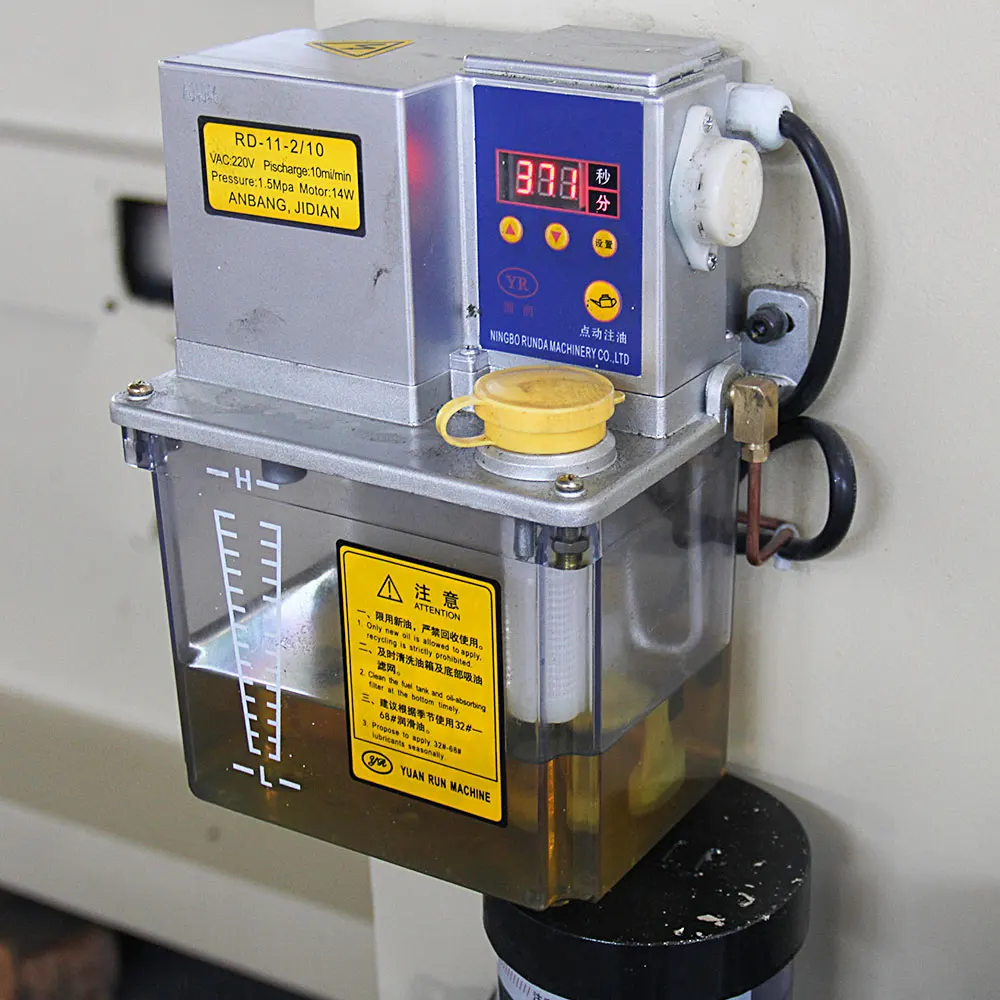 Automatic lubrication pump with digital timer and reservoir
