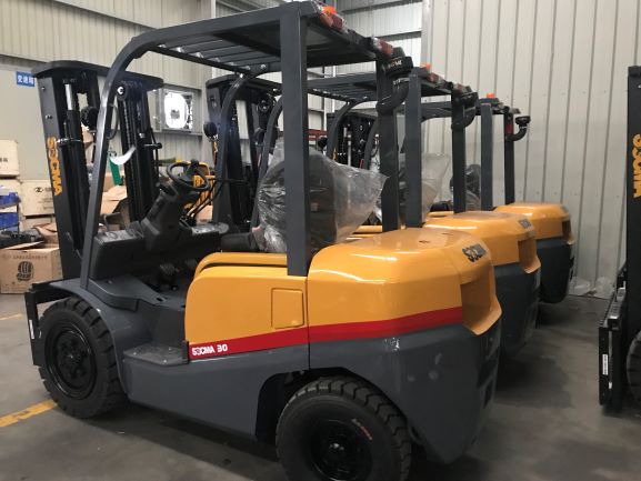 Compact forklift showing side shift attachment
