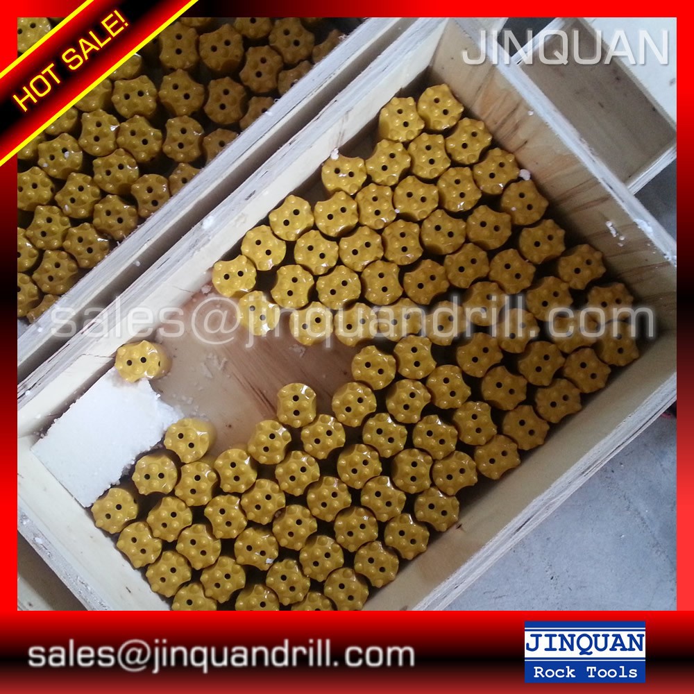 Durable rock drilling tools for quarry applications