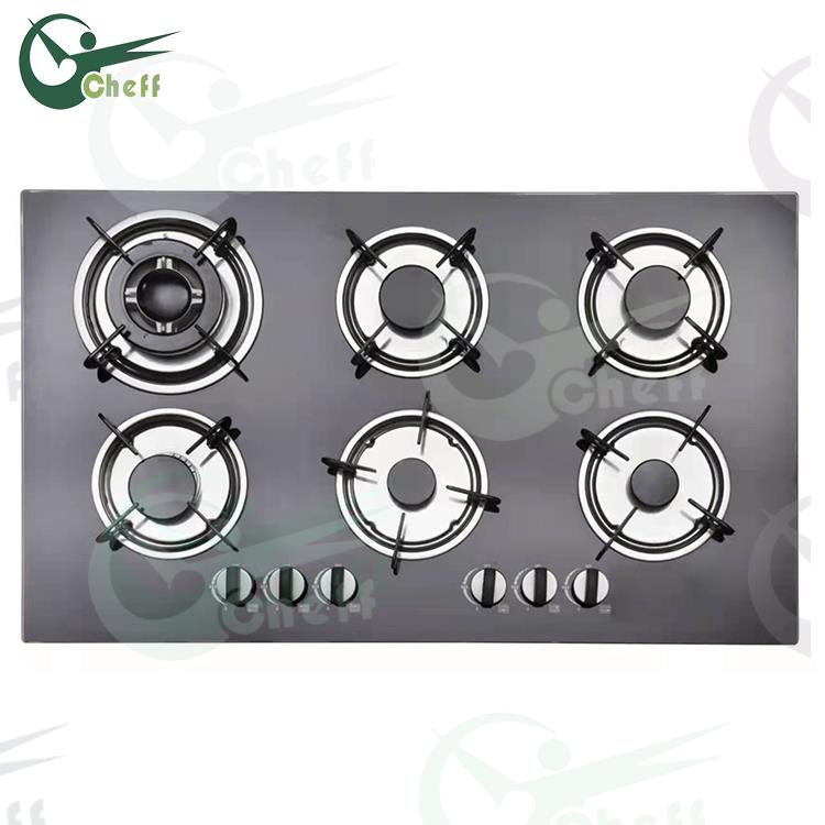 Top view of the six-burner glass gas cooktop showing burner layout and glass finish