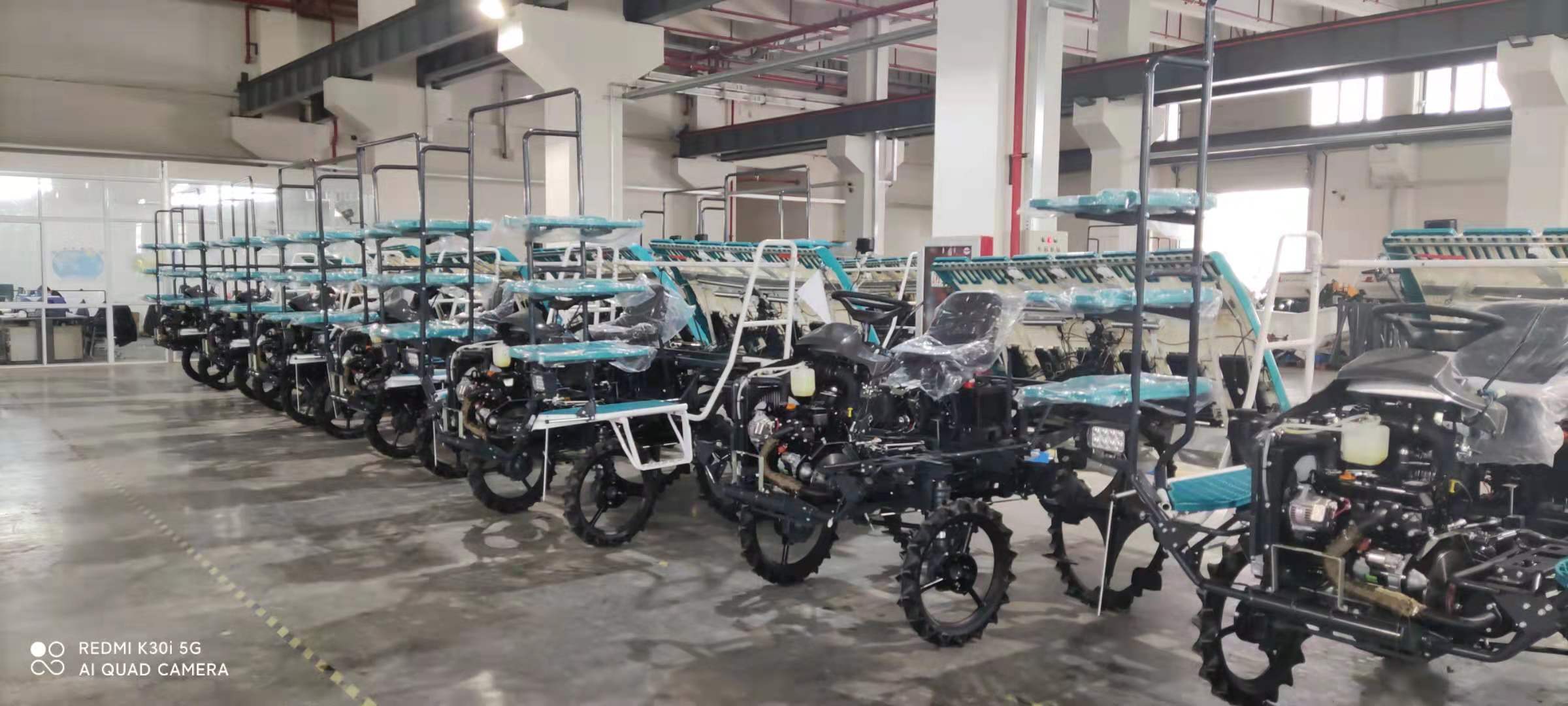 Detailed view of the rice transplanter chassis and planting mechanism
