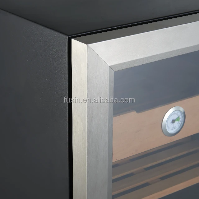 Cigar cooler with glass door and wooden shelves