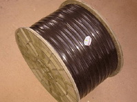 Heavy-Duty Black Power Cable on Wooden Reel