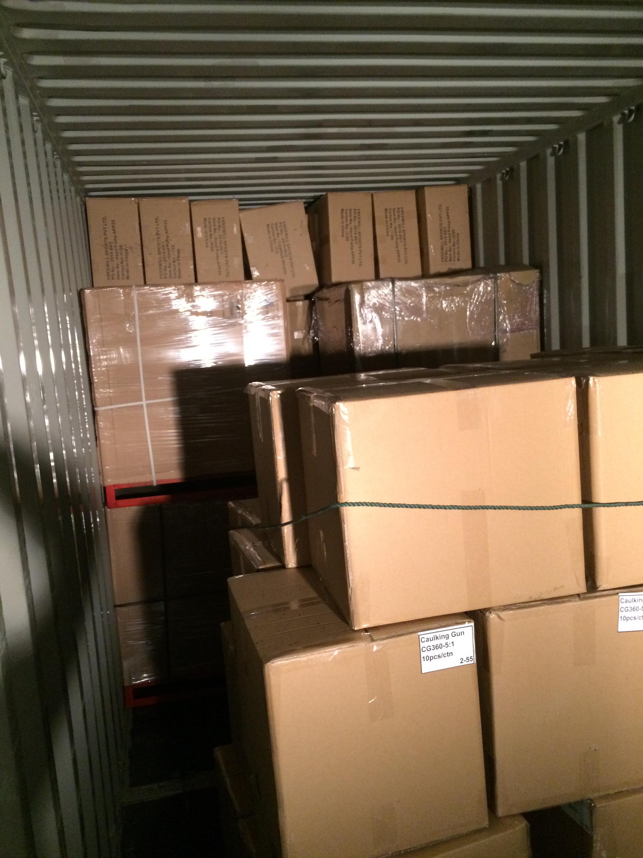 Stacked component boxes in shipping container