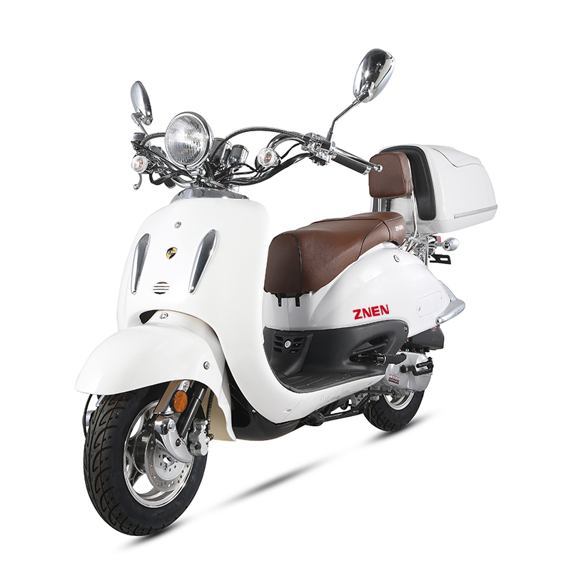 Front view showing retro headlight and chrome mirrors