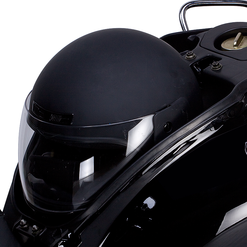 Integrated helmet storage compartment