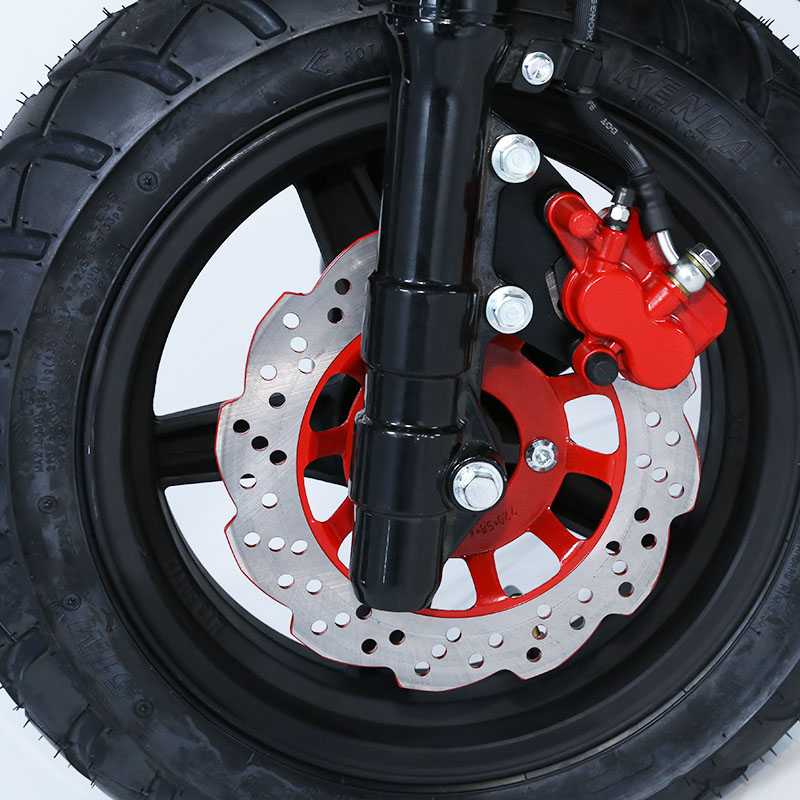 Front wheel assembly with disc brake and suspension