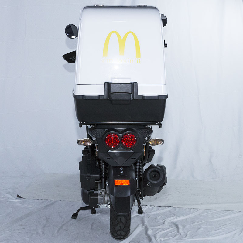Rear view of the scooter and exhaust system