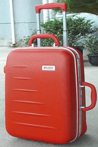 Red Hardshell Suitcase with Telescoping Handle