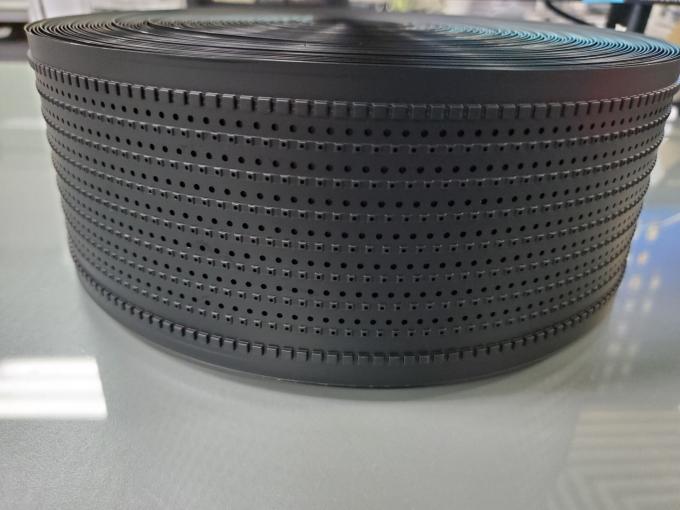 Embossed carrier tape with sprocket holes