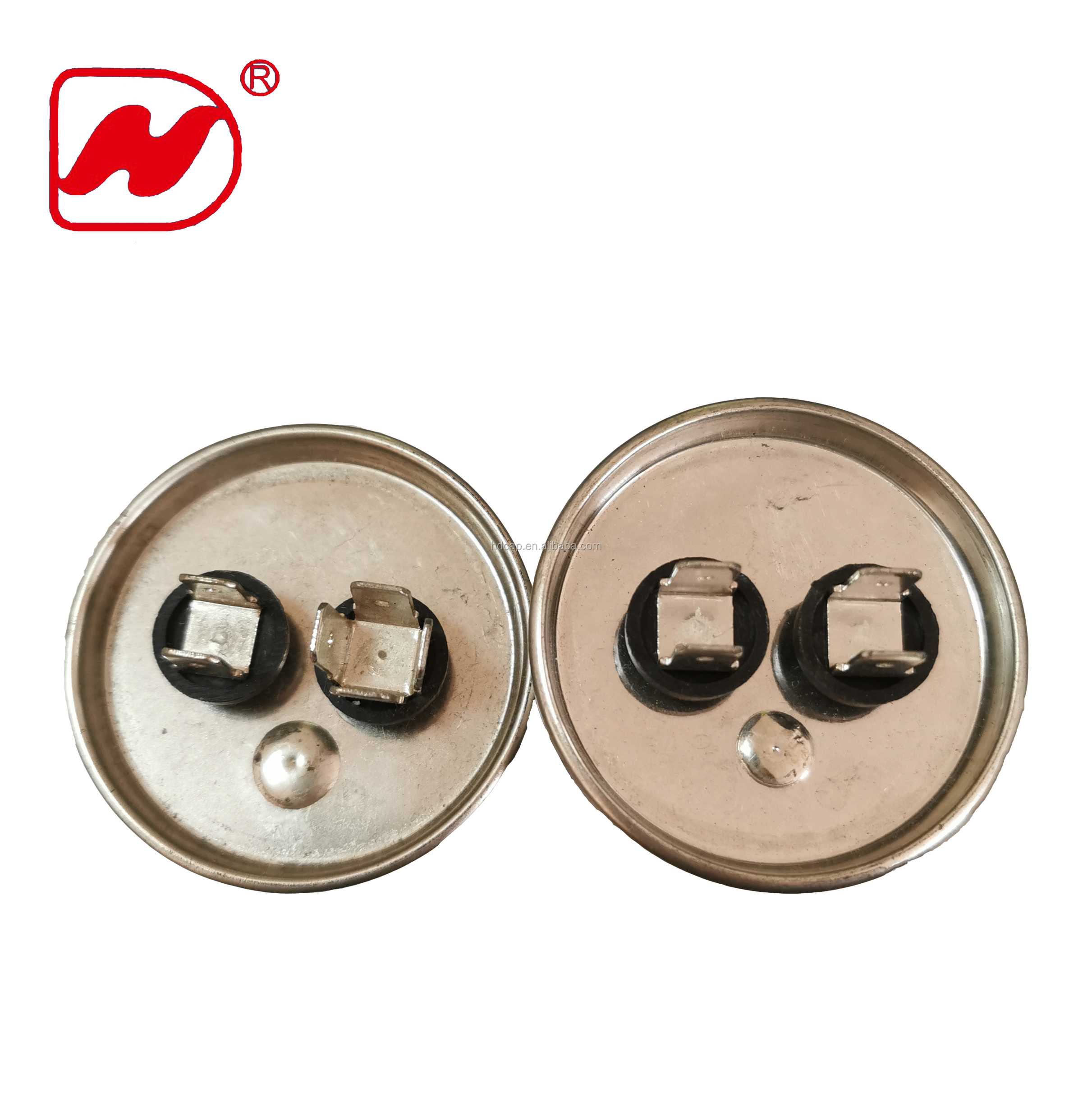 Close-up of CBB65 capacitor terminals