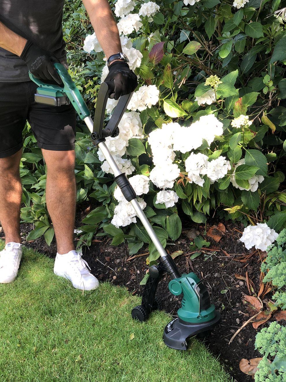 Trimmer in use for lawn edging