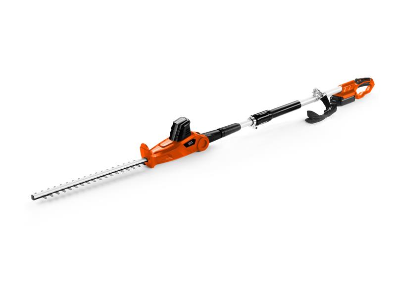 Cordless telescopic hedge trimmer in use