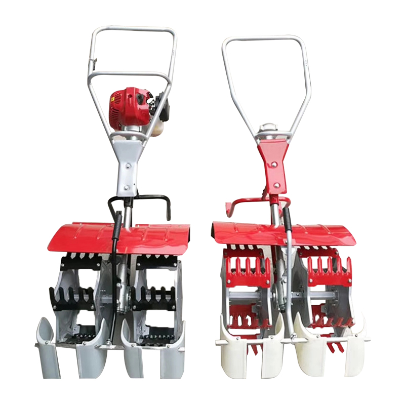 Gasoline powered paddy rice weeder in a field