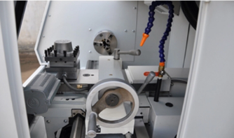 Close-up of CNC lathe spindle and tool turret