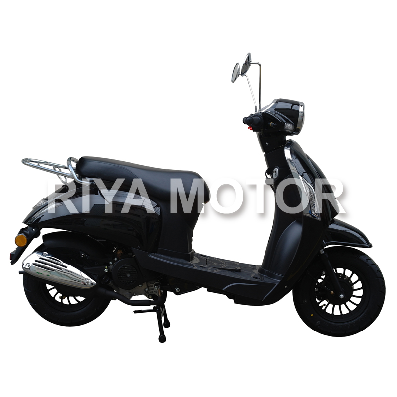 Scooter showing rear luggage rack and exhaust