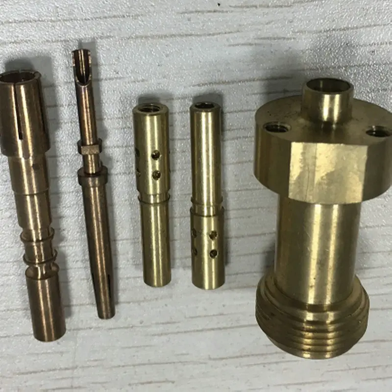 Intricate CNC machined brass components with varying geometries