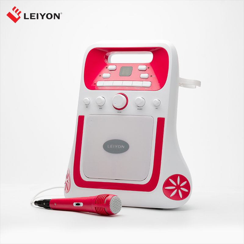Portable kids karaoke machine with CD+G player and microphone