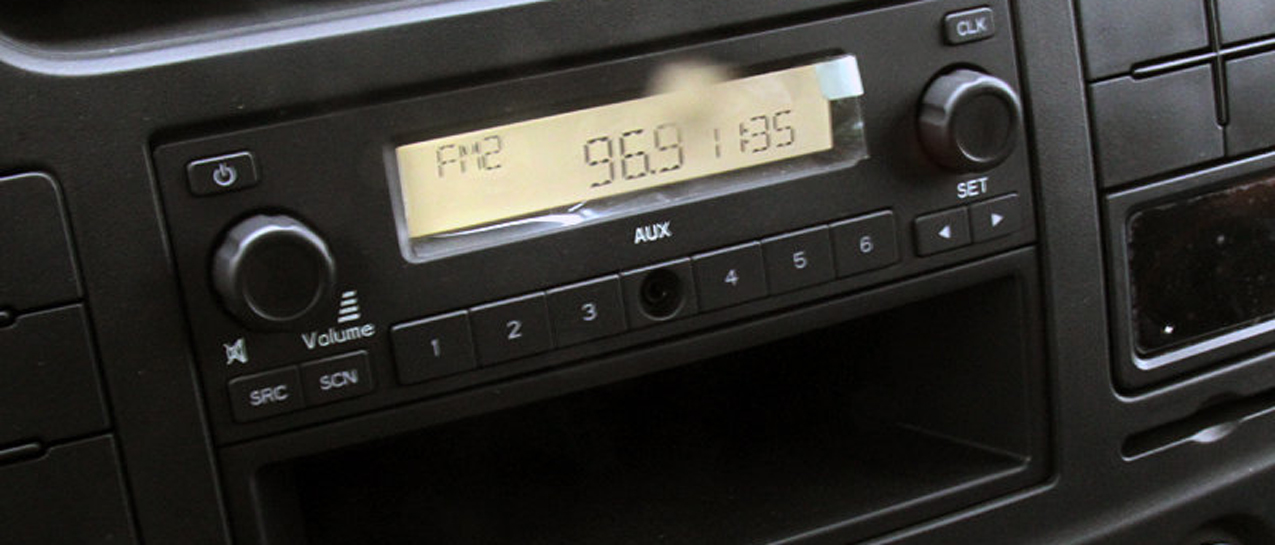 In-dash radio and media receiver