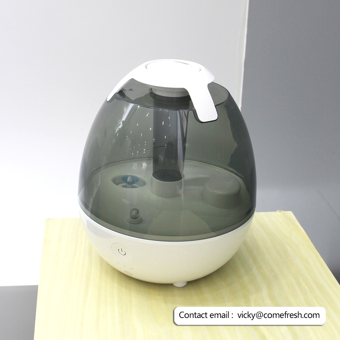 Sleek modern humidifier on a desktop surface