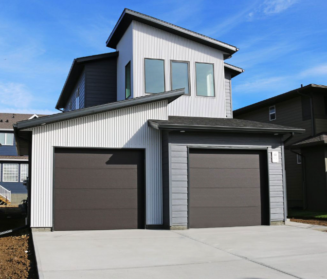 Residential building with vertical corrugated metal siding