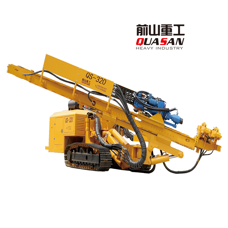 Close up of hydraulic drilling mast and crawler tracks