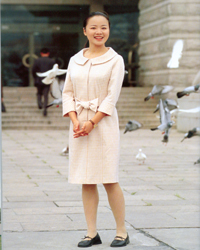 Women's Light Colored Dress with Bow