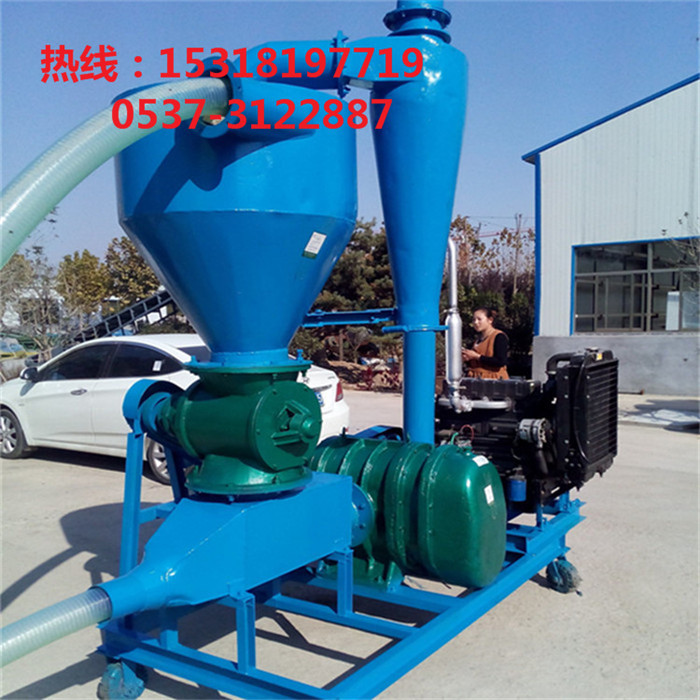 Mobile diesel engine pneumatic grain suction machine in a field setting