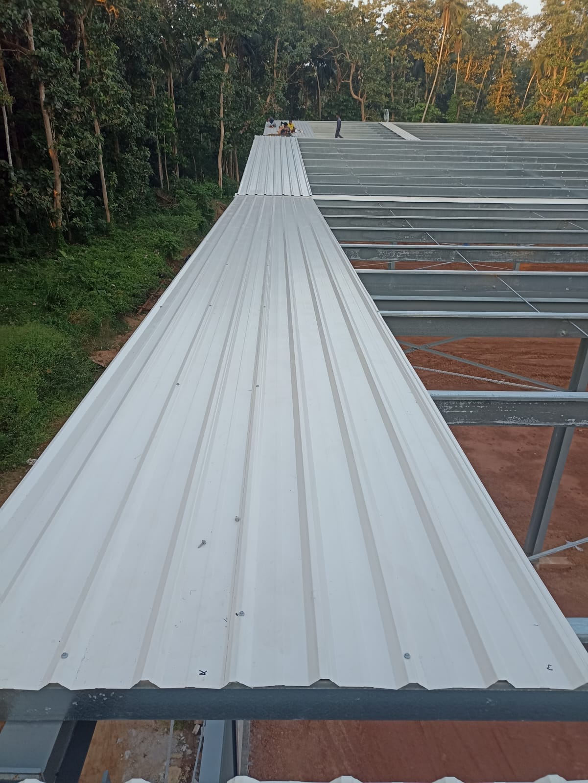 Side view of roll forming equipment