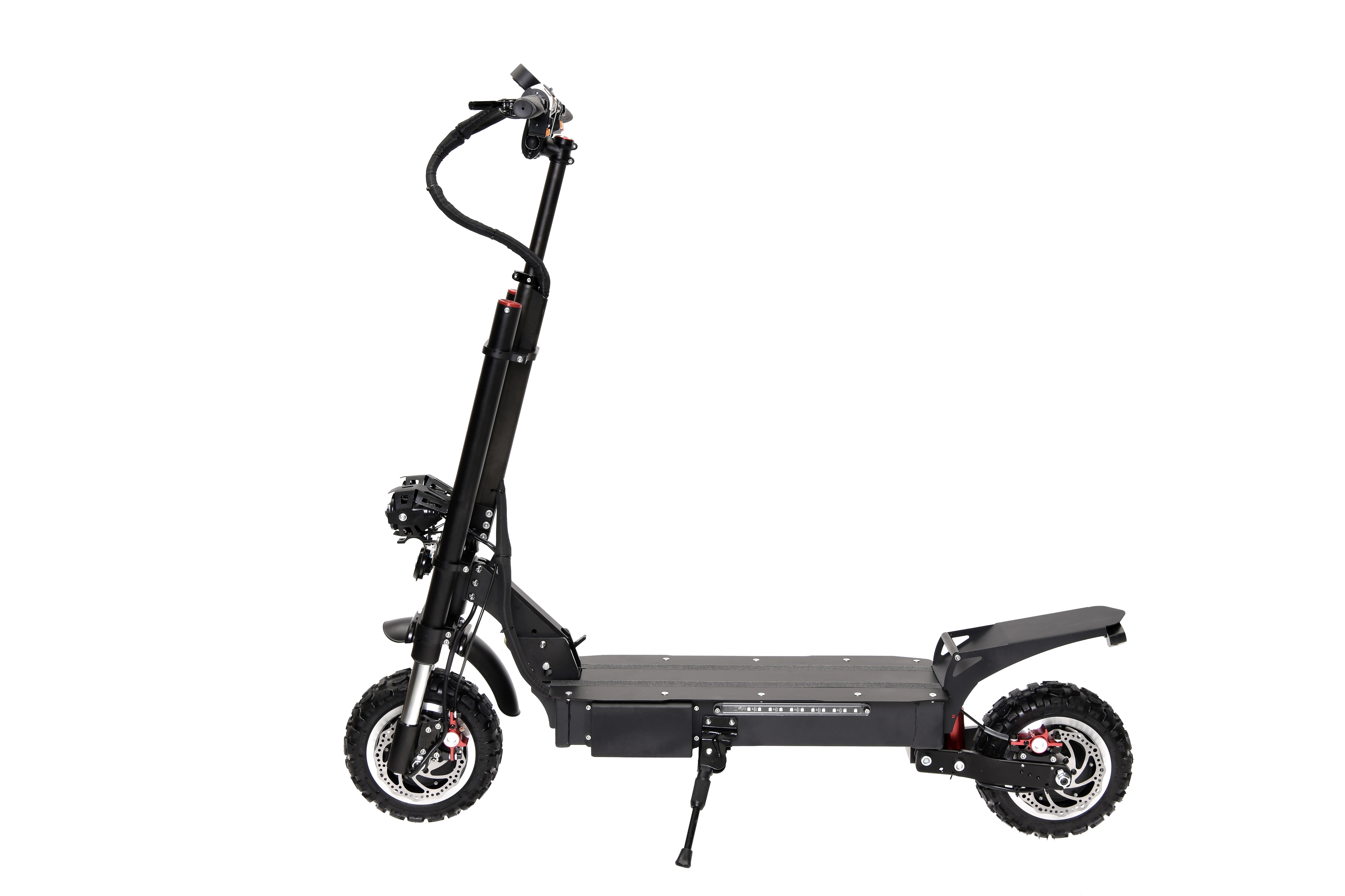 Side profile of the dual motor electric scooter showing rugged frame and tires