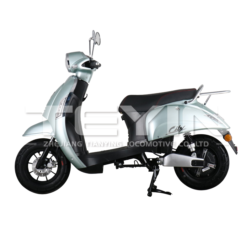 Side view of the mint green electric scooter