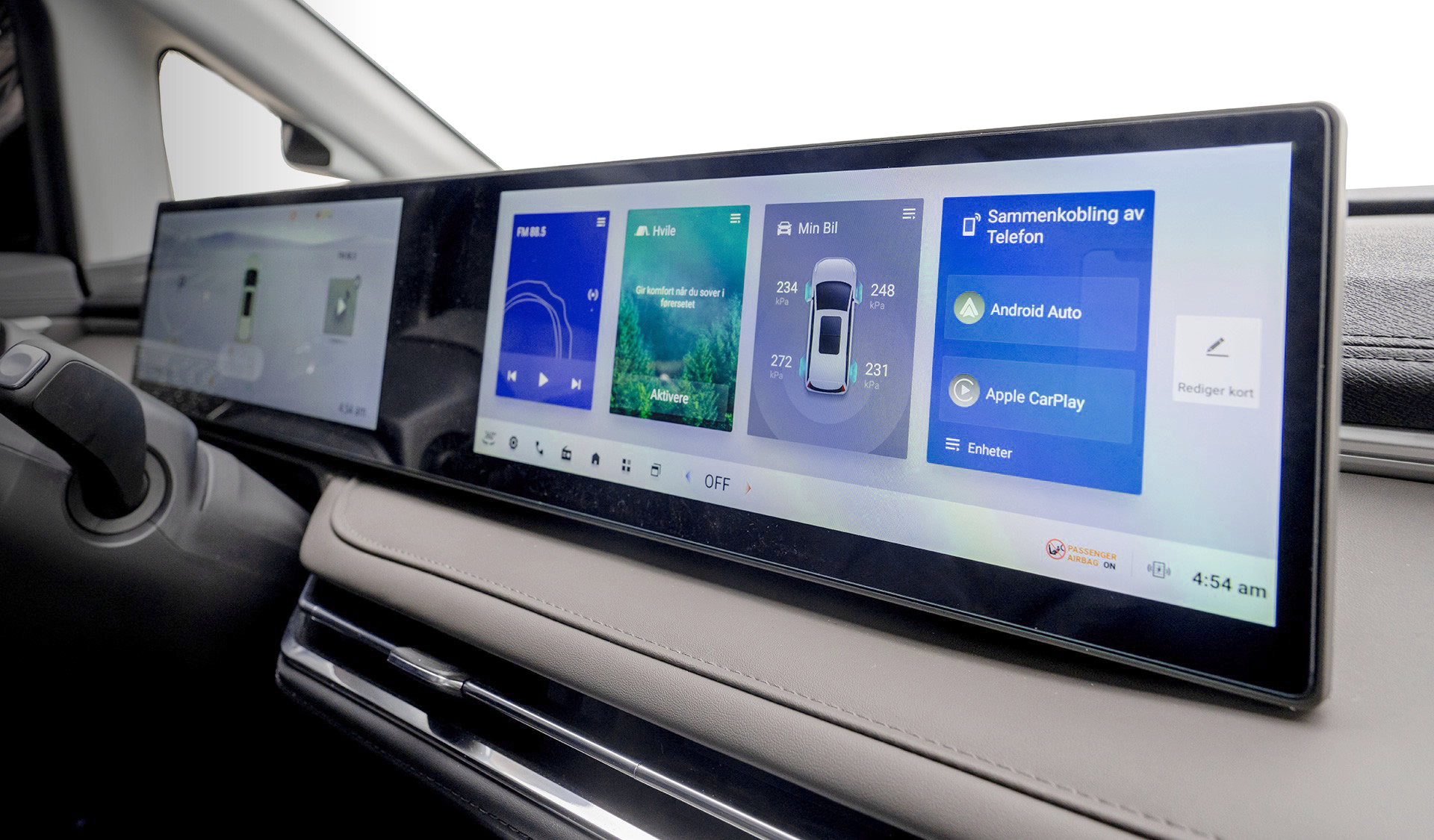Infotainment system display in the electric MPV showing vehicle status and connectivity options