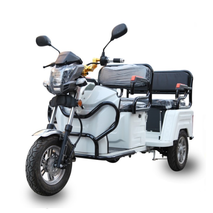 Front view of the electric tricycle showing headlight and structure