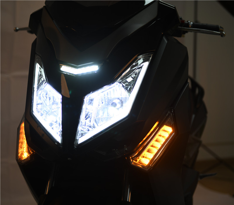 Front view of the motorcycle highlighting LED lighting