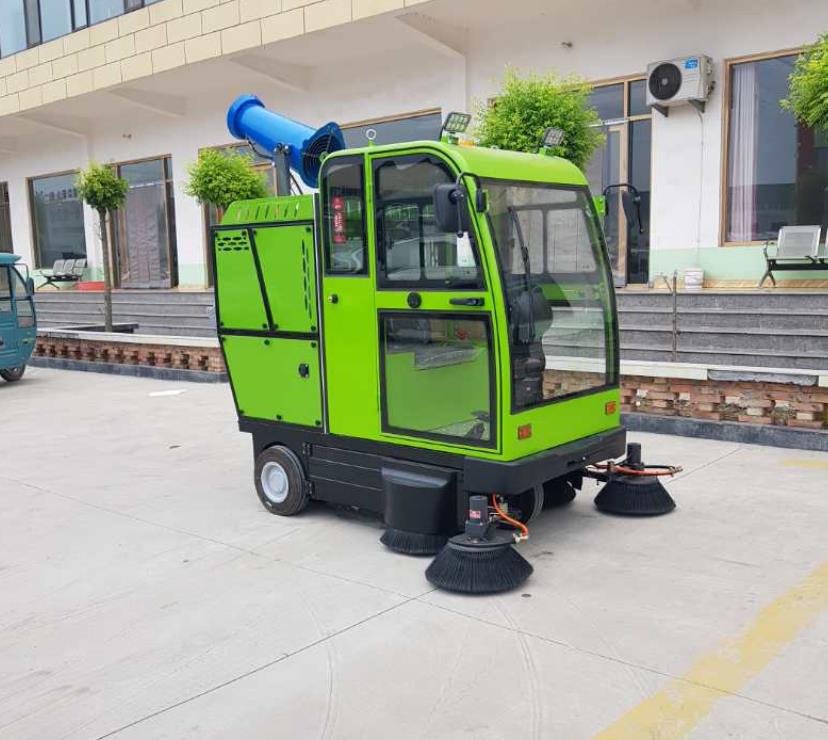 Electric street sweeper in operation