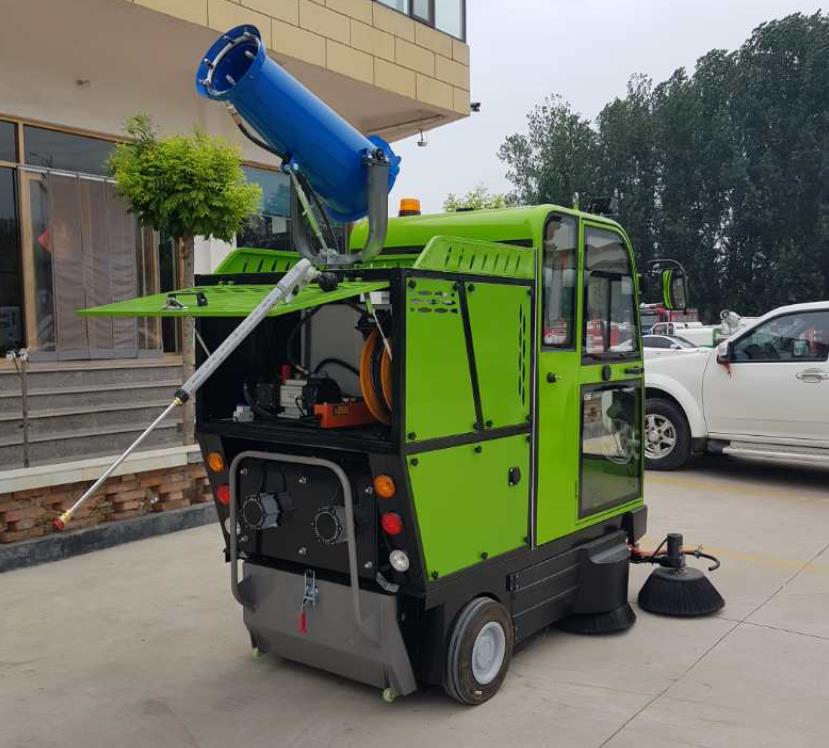 Close-up of the sweeper cab and cleaning brushes
