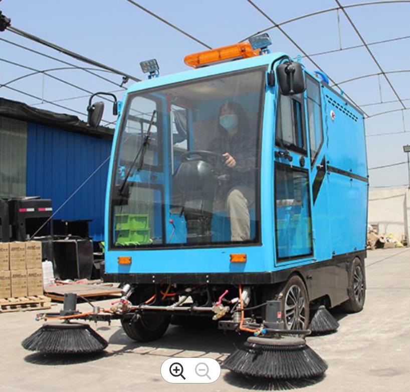 Front view of the electric sweeper with fog cannon