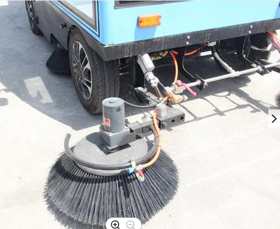 Rear view of the sweeper showing waste disposal and filter system